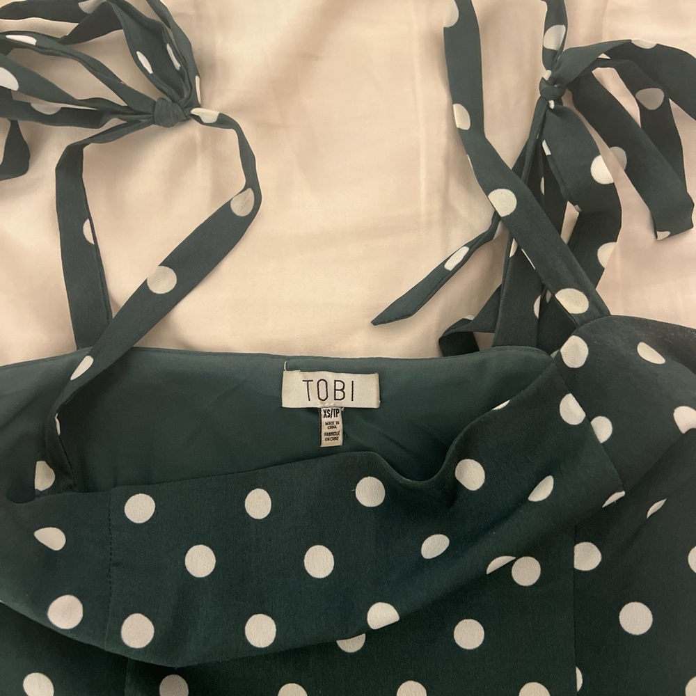 Green and white polka dot mini dress with tie straps size xs